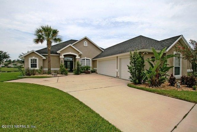 Contemporary Florida Styling in this 4/3, 2,600 feet home in Old Mill Branch
